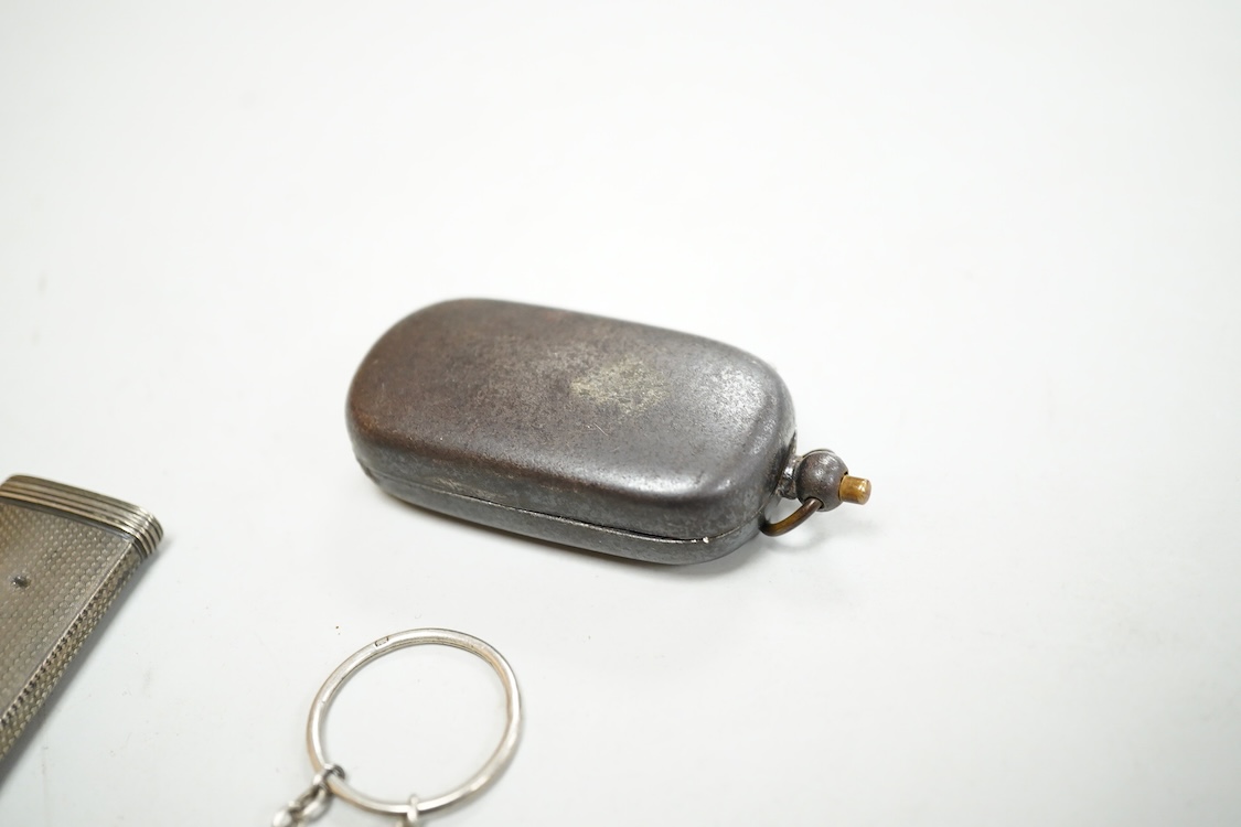 A William IV engine turned silver etui case, maker GC, London, 1836, 61mm, together with a silver purse mount, amethyst? set fob seal and a base metal sovereign case.